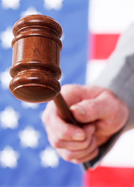 istock US justice with gavel, Stars and Stripes in background 123201511