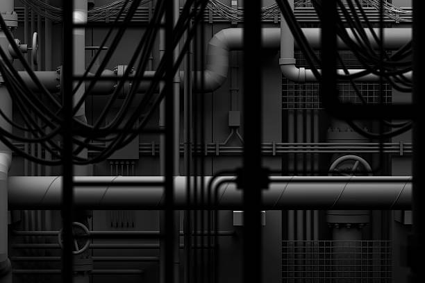 Pipes and cables in a mechanical room stock photo