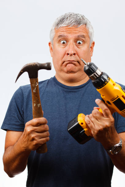 handyman - home improvement work tool hammer portrait imagens e fotografias de stock