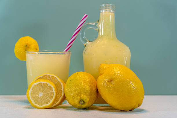 istock Lemon juice and fruit. Sicilian lemon (Citrus limon) 1232064250