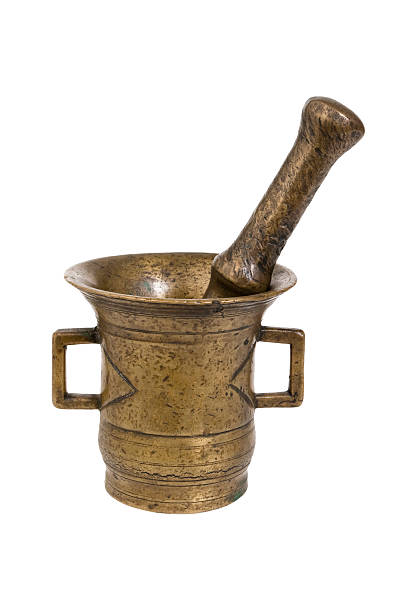 brass mortar and pestle stock photo