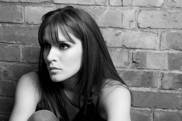 istock Beautiful woman deep in thought (Black and White) 123208825