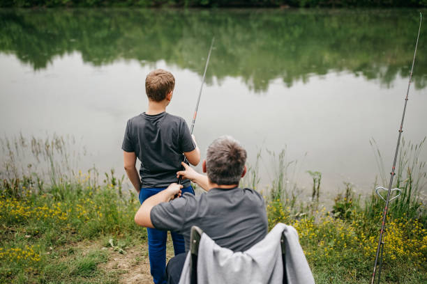 istock Father and son fishing 1232139842