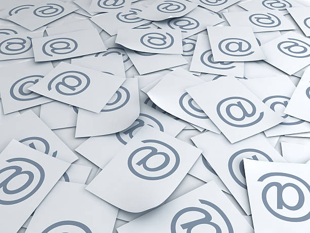 istock Scattered papers that have the @ symbol on each of them  123214882