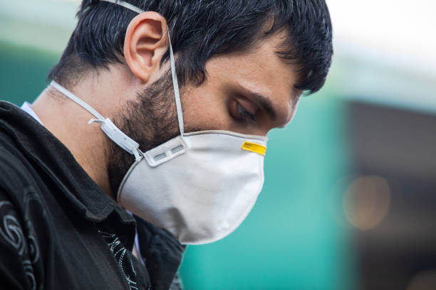 istock African worker  wearing a mask 1232184118