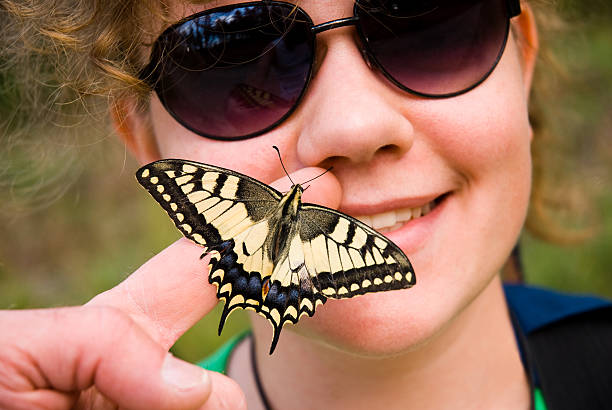istock Girl with butterfly 123219407