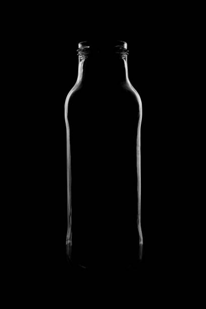 istock Silhouette of a bottle with a beautiful shape on a black background 1232205153