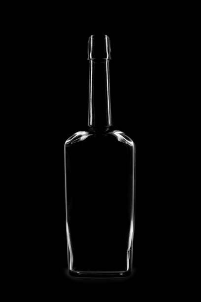 istock Silhouette of a bottle with a beautiful shape on a black background 1232217381