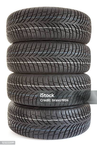 Impilati Wintertires - Fotografie stock e altre immagini di Ammucchiare - Ammucchiare, Catasta, Colore nero