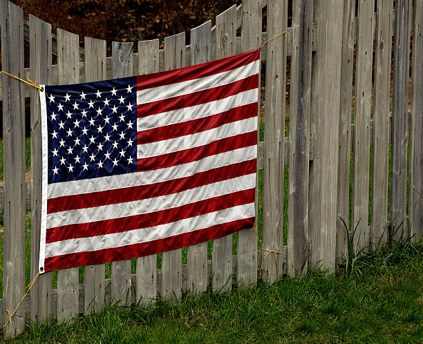 istock New US Flag on Fence 123224140