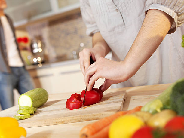 istock Young couple cooking in kitchen 123225405