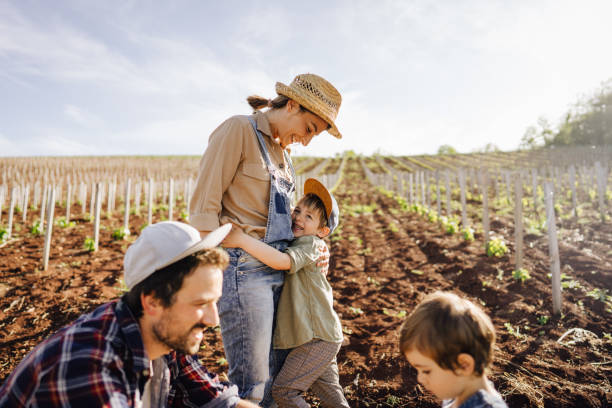 istock Smiling family spending together sunny day on a farm 1232305806