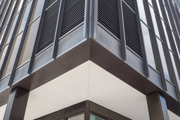 istock Close up of a generic black office building in a plain urban downtown 1232316092