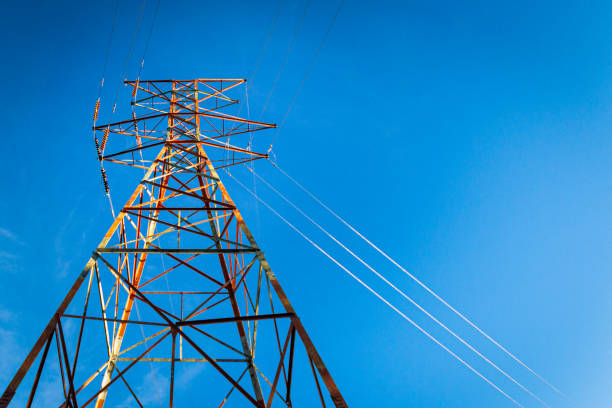 electrical wires against blue sky, maine, usa - wouter imagens e fotografias de stock