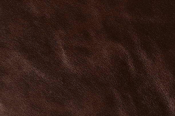 istock Dark brown leather texture. Can be used as background in art or design projects. 1232387325