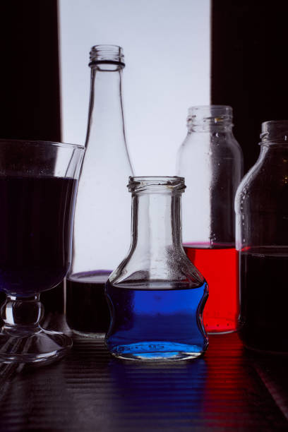 istock bottled on a light background with blue and red liquid silhouette photo 1232394192