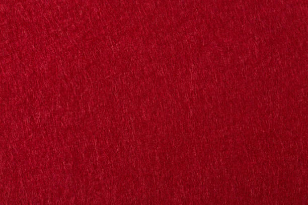 istock Felt background in red color useful for christmas backgrounds. 1232396231