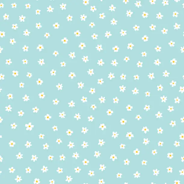 Vector illustration of White ditsy flowers on blue seamless vector pattern. Floral background with small white flowers. Liberty style. Floral repeating texture for fashion prints. Ditsy print. Spring, summer decor