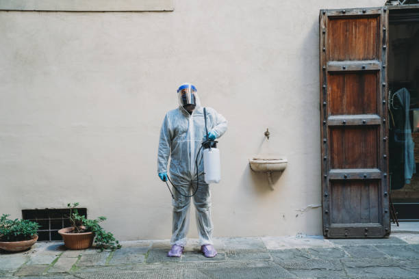 istock Portrait of a sanitation worker with protective suit 1232469719