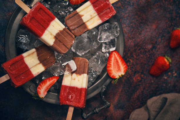istock Preparing Vanilla, Strawberry, Chocolate Ice Cream on Stick 1232507057