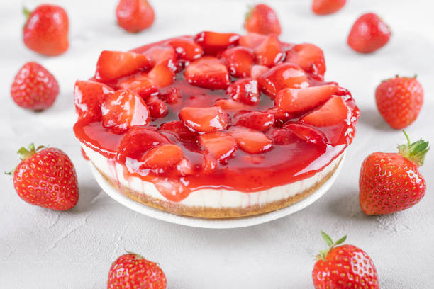 istock cheesecake with strawberry and fresh berries on gray table 1232513144