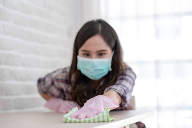 istock Asian woman cleaning home 1232550164