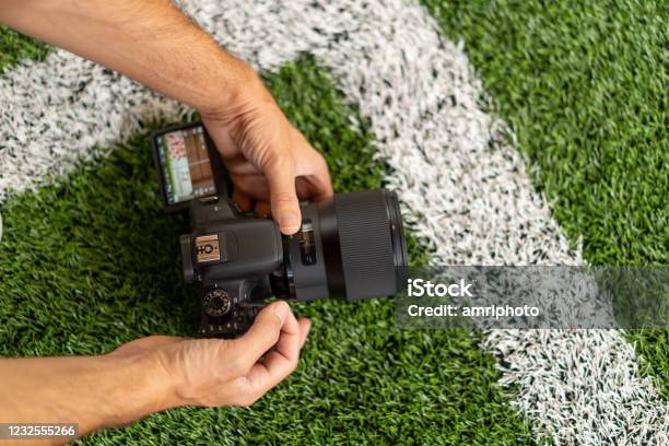 Top View Hands On Camera During Shooting Indoor Soccer Stock Photo - Download Image Now
