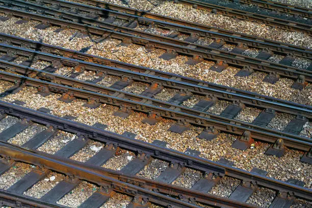 Photo of Detail of steel train tracks at Cambridge railway station. A beautiful and peaceful university town in eastern England.