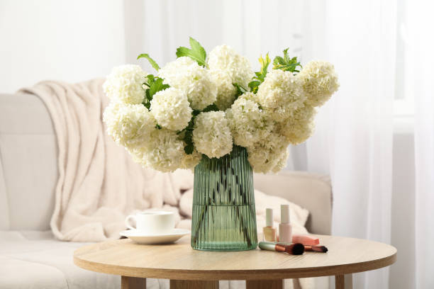 istock Composition with hydrangea flowers, cup of coffee and cosmetics. Spring plant 1232559774