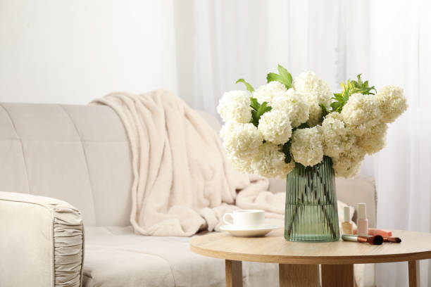 istock Composition with hydrangea flowers, cup of coffee and cosmetics. Spring plant 1232560413