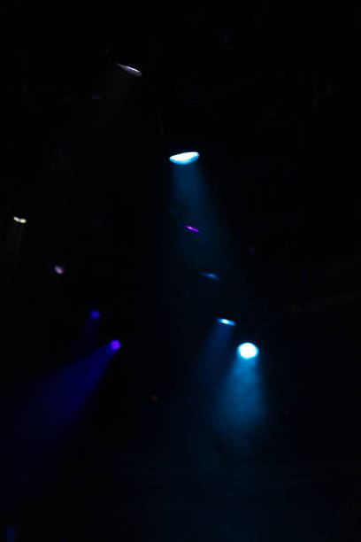 istock lights spotlights and smoke over the stage 1232594823