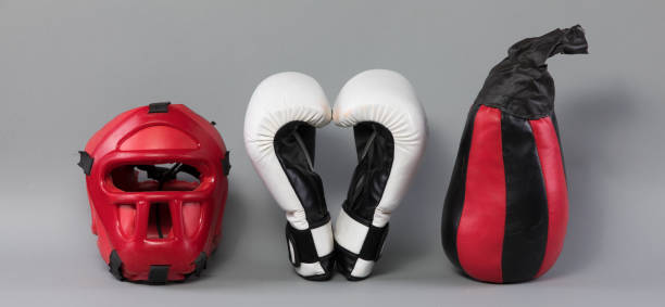 istock white boxing gloves isolated on gray background 1232595329