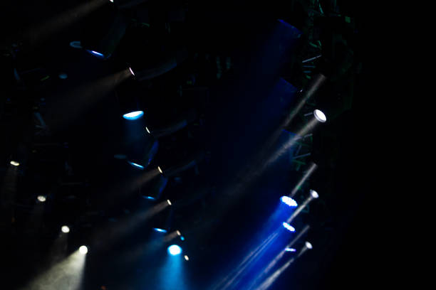 istock lights spotlights and smoke over the stage 1232596858