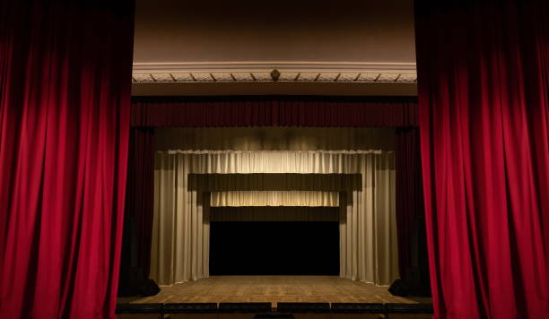 istock Theater lights spotlights and smoke over the stage 1232610346