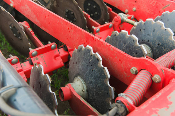 istock Agriculture harrow discs with scratches close up 1232633425