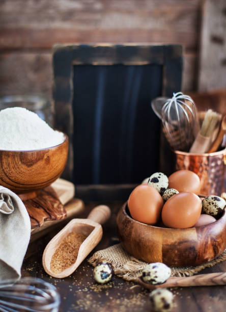 istock Baking ingredients and blackboard on background, wooden rustic style 1232650155