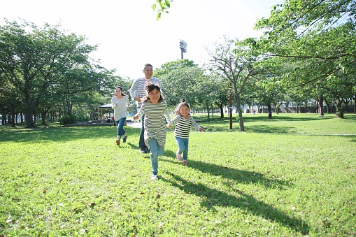 Japanese family enjoy weekend at the public park