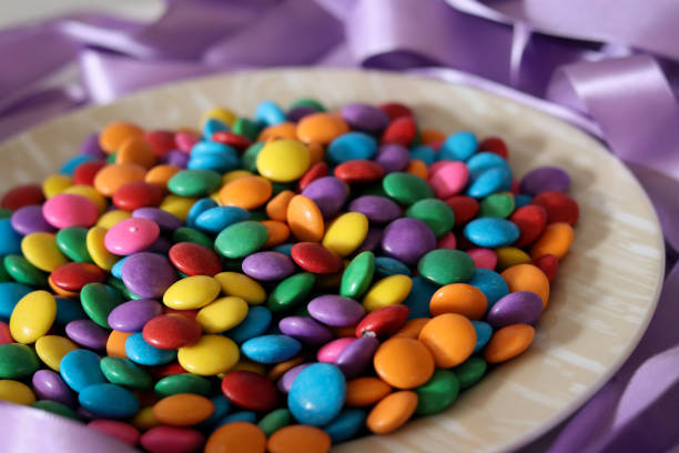 istock Beautiful colorful chocolates decorating the table. 1232720178