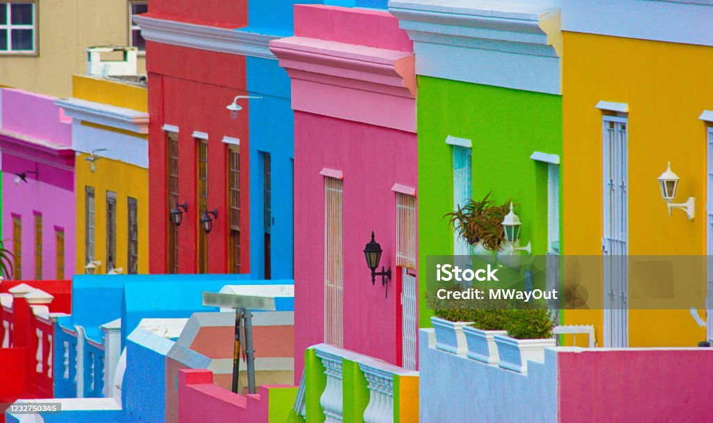 Colorful Bo Kaap neighborhood, Cape Town, South Africa In Cape Town, South Africa the Bo-Kaap neighborhood has residential homes painted in a variety of bright colors. Cape Town Stock Photo