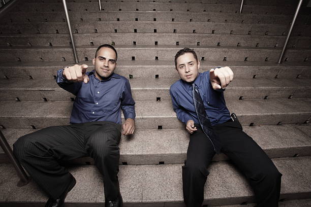istock Businessmen pointing towards the camera 123276643
