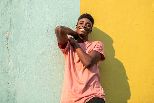 portrait of a young handsome african man. - fashion model pink beauty fashion imagens e fotografias de stock