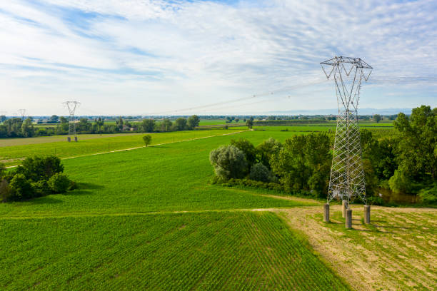 istock electricity tower in a wonderful field 1232811843