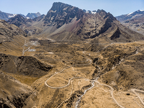 Aerial view of a winding road in Las Arenas Valley at Cajon del Maipo near to Santiago de Chile in Central Chile