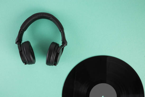istock Vinyl record and headphones on abstract pastel background with copy space 1233043538
