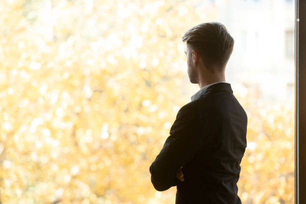 istock Boss looking to autumn scenery feels satisfied with successful workday 1233104975