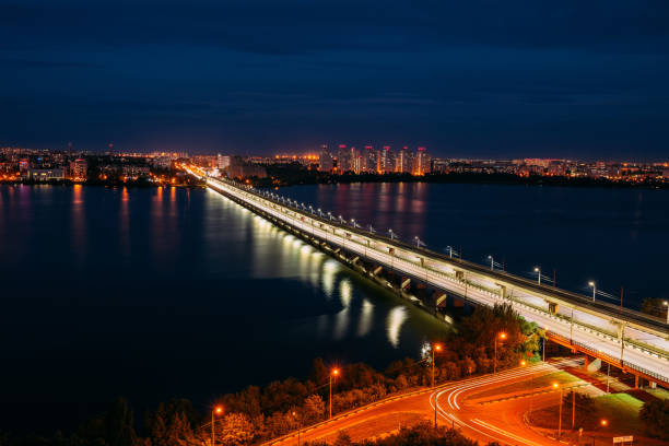 Night Voronezh. Northern bridge over Voronezh river, aerial view.