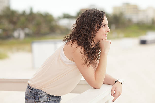 istock Woman leaning on the ledge 123321679