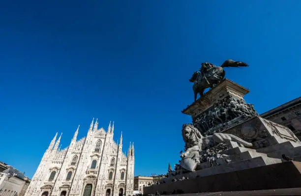 Photo of Duomo square Cathedral (Mariae Nascenti) with statue of Victor Emanuel 2nd. Milan, Italy