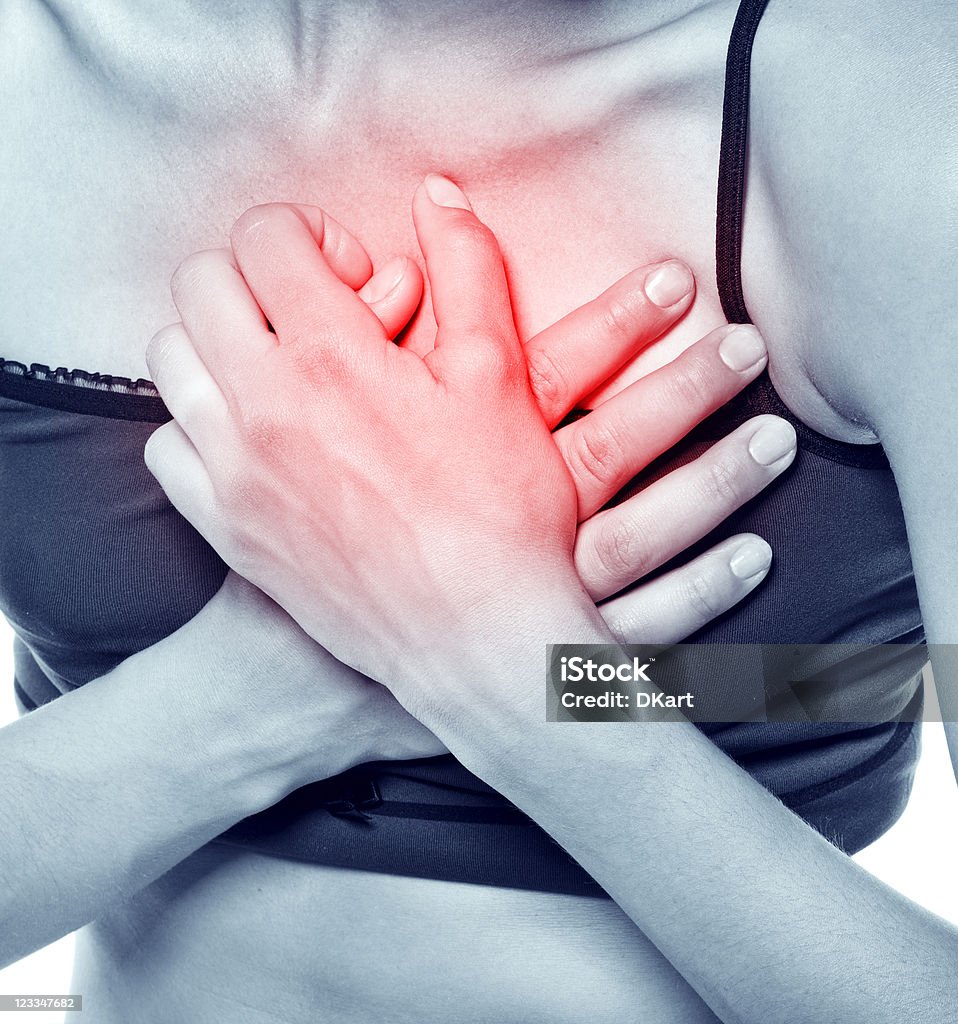 Donna avendo un attacco di cuore - Foto stock royalty-free di Adulto