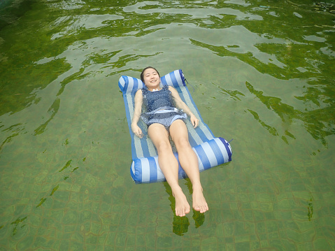 Japanese girl enjoys having hot spring